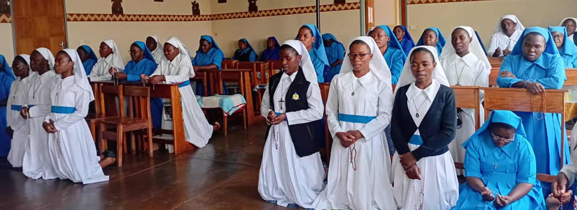 sisters in a prayer session